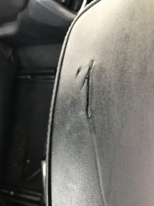 Car headrest damage on Porsche Cayenne