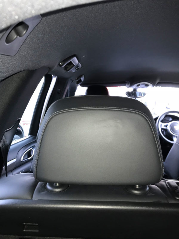 Car headrest damage repaired on Porsche Cayenne Leather Revive